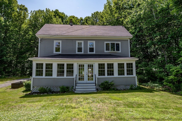 3 Adell Rd, Readfield, ME 04355 - view of front of home with entry steps, french doors, a front lawn, and a shingled roof