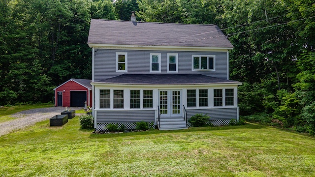 3 Adell Rd, Readfield, ME 04355 - view of front of house with entry steps, roof with shingles, an outdoor structure, gravel driveway, and a chimney