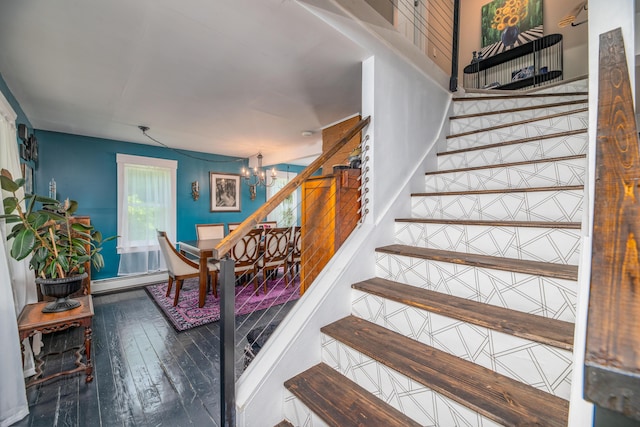 3 Adell Rd, Readfield, ME 04355 - staircase featuring a chandelier, a baseboard radiator, and wood-type flooring