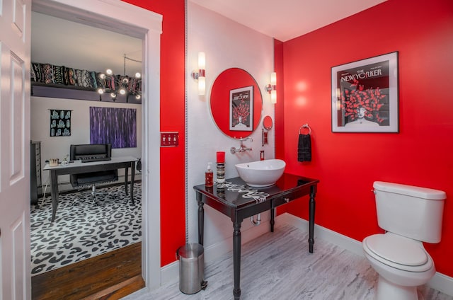 3 Adell Rd, Readfield, ME 04355 - bathroom featuring a chandelier and wood finished floors