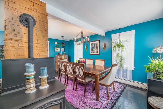3 Adell Rd, Readfield, ME 04355 - dining space featuring a baseboard radiator, beamed ceiling, wood finished floors, and a chandelier