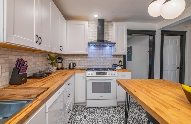 3 Adell Rd, Readfield, ME 04355 - kitchen with butcher block counters, white appliances, wall chimney exhaust hood, white cabinets, and light tile patterned flooring