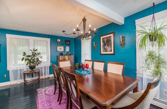3 Adell Rd, Readfield, ME 04355 - dining room with a chandelier, wood finished floors, a baseboard radiator, and beamed ceiling