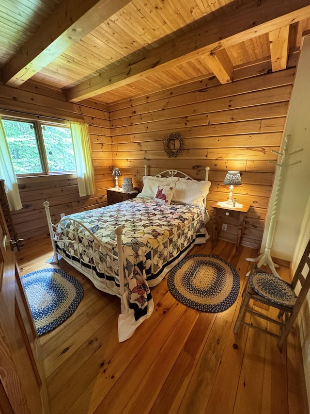 362 N Raymond Rd, Poland, ME 04274 - bedroom featuring hardwood / wood-style flooring, wood walls, and a wooden ceiling with exposed beams