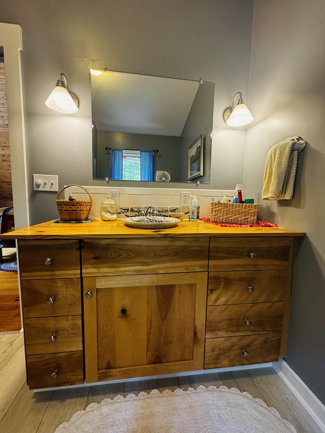 362 N Raymond Rd, Poland, ME 04274 - bathroom with wood finished floors and vanity