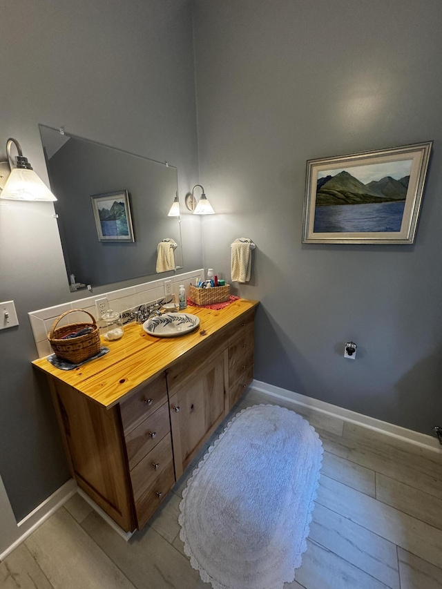 362 N Raymond Rd, Poland, ME 04274 - bathroom with vanity and wood finished floors