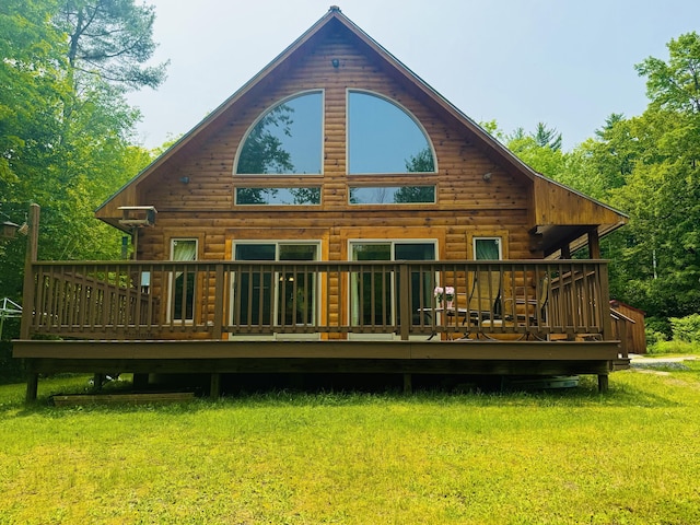 362 N Raymond Rd, Poland, ME 04274 - back of property featuring a lawn, a deck, and log siding