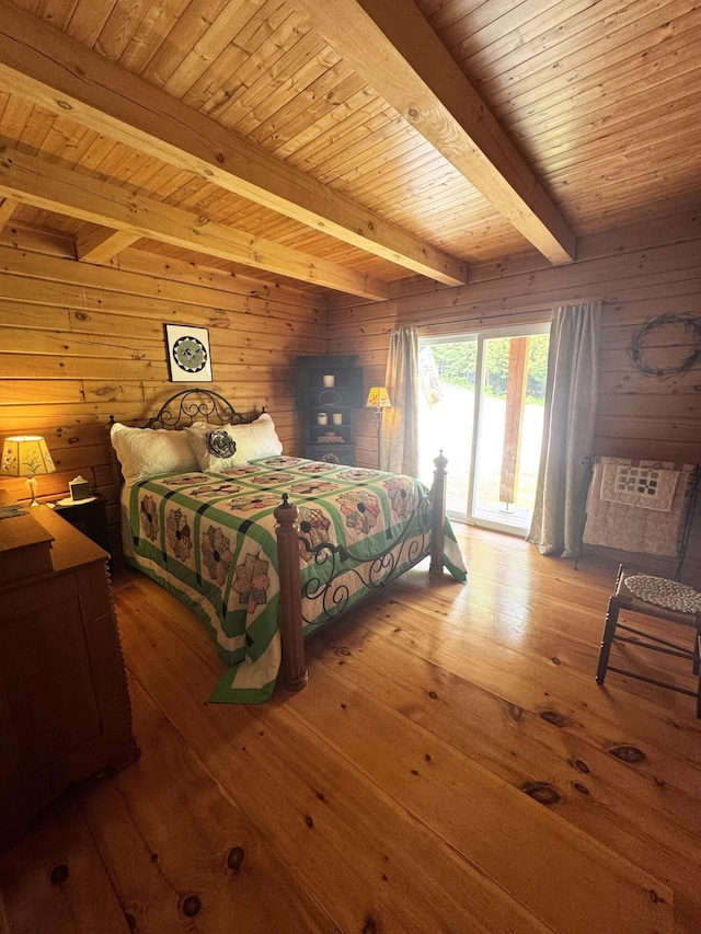 362 N Raymond Rd, Poland, ME 04274 - bedroom featuring wooden walls, access to outside, a wood ceiling with exposed beams, and hardwood / wood-style floors