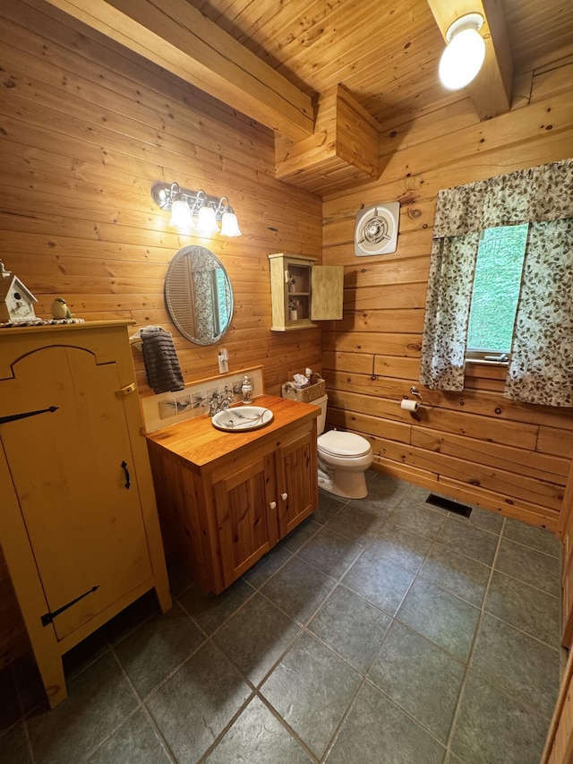 362 N Raymond Rd, Poland, ME 04274 - bathroom with a wood ceiling with exposed beams, wooden walls, and tile patterned floors