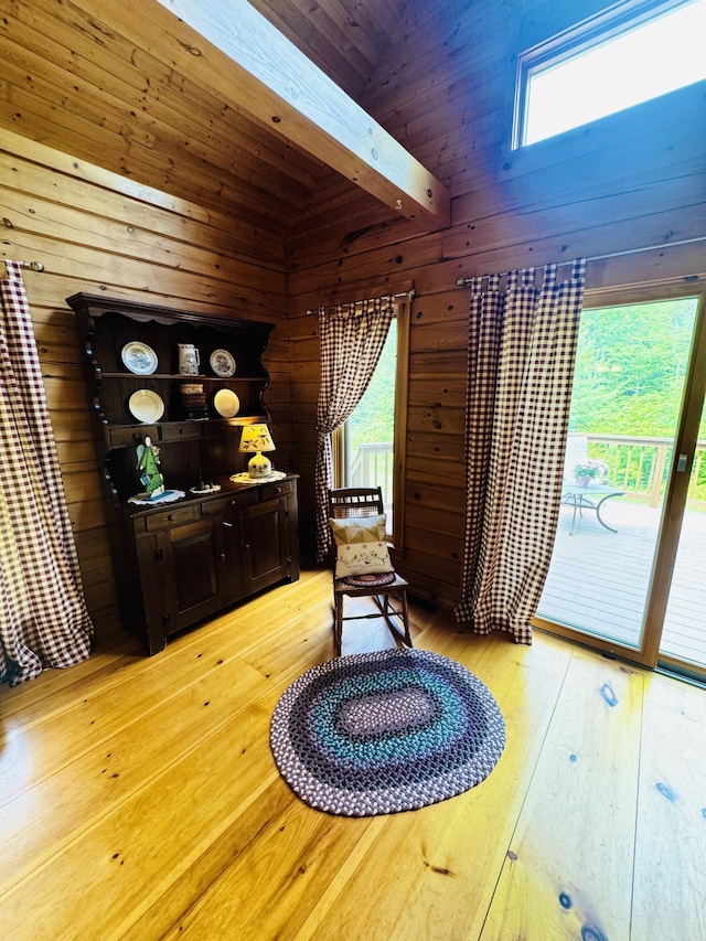 362 N Raymond Rd, Poland, ME 04274 - sitting room with light wood-type flooring, plenty of natural light, wooden walls, and wood ceiling