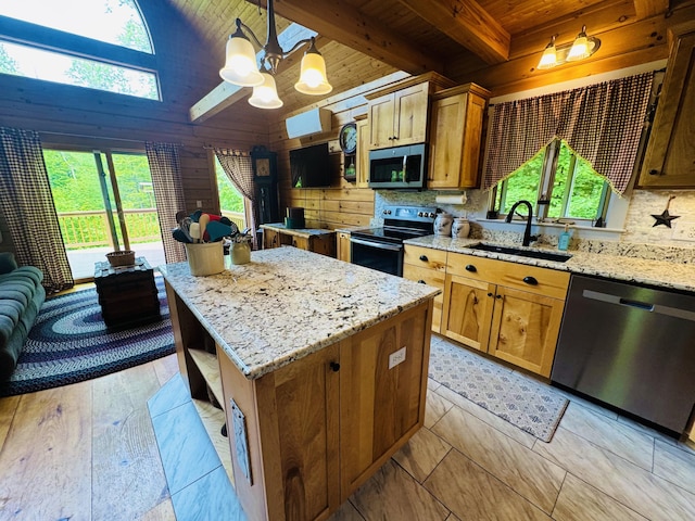 362 N Raymond Rd, Poland, ME 04274 - kitchen featuring appliances with stainless steel finishes, wooden ceiling, tasteful backsplash, plenty of natural light, and wood walls