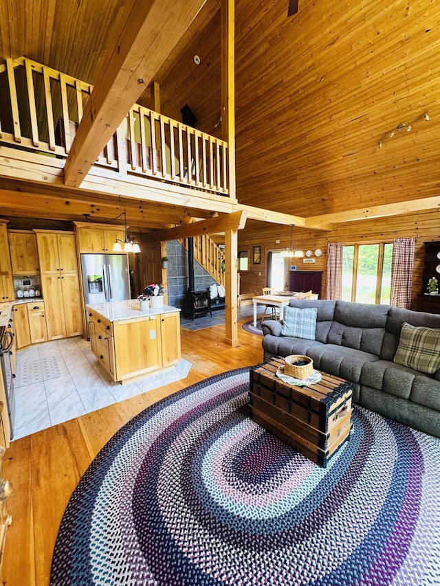362 N Raymond Rd, Poland, ME 04274 - living area featuring high vaulted ceiling, wood walls, and wood ceiling