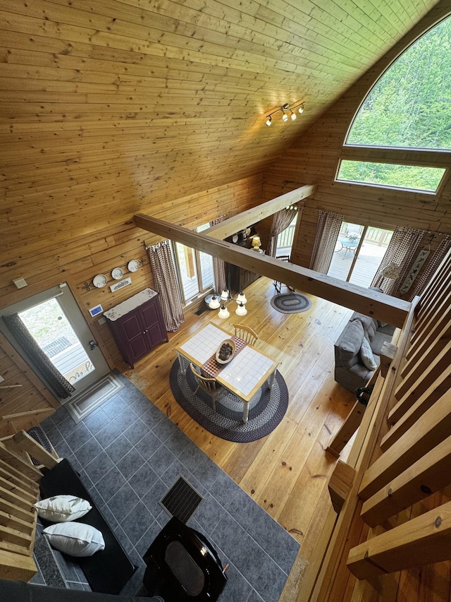 362 N Raymond Rd, Poland, ME 04274 - living area with high vaulted ceiling, healthy amount of natural light, wooden walls, wooden ceiling, and hardwood / wood-style floors