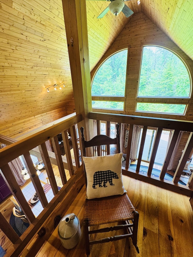 362 N Raymond Rd, Poland, ME 04274 - stairway featuring high vaulted ceiling, a ceiling fan, wooden walls, wood ceiling, and wood-type flooring