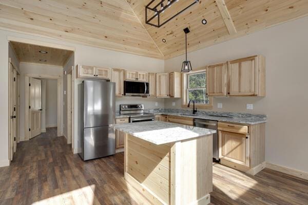 18 Thayer Way, Bethel, ME 04217 - kitchen with stainless steel appliances, wood ceiling, light brown cabinets, dark wood-type flooring, and a kitchen island