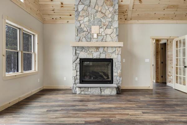 18 Thayer Way, Bethel, ME 04217 - unfurnished living room featuring wooden ceiling, wood finished floors, vaulted ceiling, a fireplace, and french doors