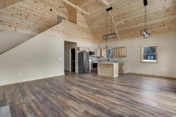 18 Thayer Way, Bethel, ME 04217 - kitchen with open floor plan, appliances with stainless steel finishes, high vaulted ceiling, light countertops, and a wood ceiling with exposed beams