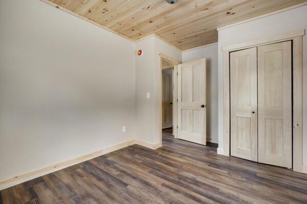 18 Thayer Way, Bethel, ME 04217 - unfurnished bedroom with wood ceiling, wood finished floors, crown molding, and a closet