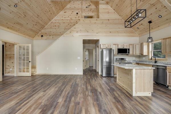 18 Thayer Way, Bethel, ME 04217 - kitchen featuring appliances with stainless steel finishes, wooden ceiling, high vaulted ceiling, open floor plan, and a kitchen island