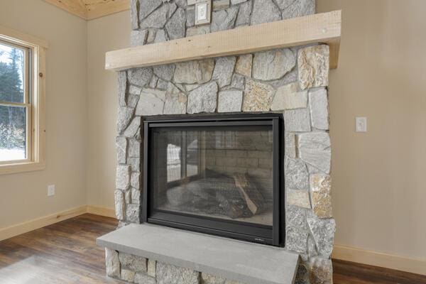 18 Thayer Way, Bethel, ME 04217 - detailed view of a fireplace and wood finished floors