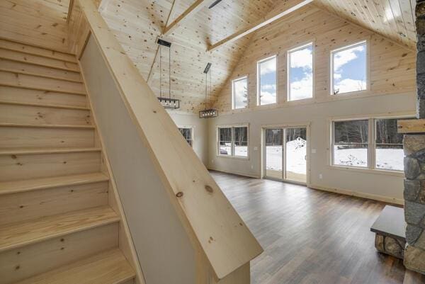 18 Thayer Way, Bethel, ME 04217 - staircase featuring wooden ceiling, high vaulted ceiling, healthy amount of natural light, and wood finished floors
