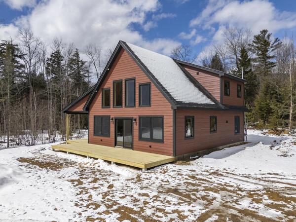 18 Thayer Way, Bethel, ME 04217 - snow covered property with a wooden deck
