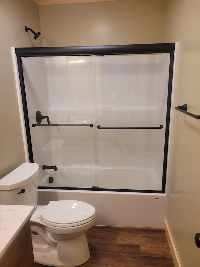 18 Thayer Way, Bethel, ME 04217 - bathroom featuring wood finished floors, vanity, and shower / bath combination with glass door