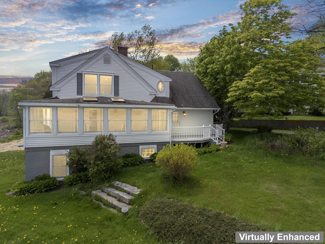 15 Church Ln, Phippsburg, ME 04562 - rear view of property featuring a chimney, a lawn, a shingled roof, and a wooden deck