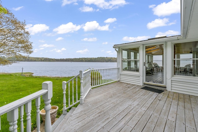 15 Church Ln, Phippsburg, ME 04562 - deck featuring a water view, a lawn, and a sunroom