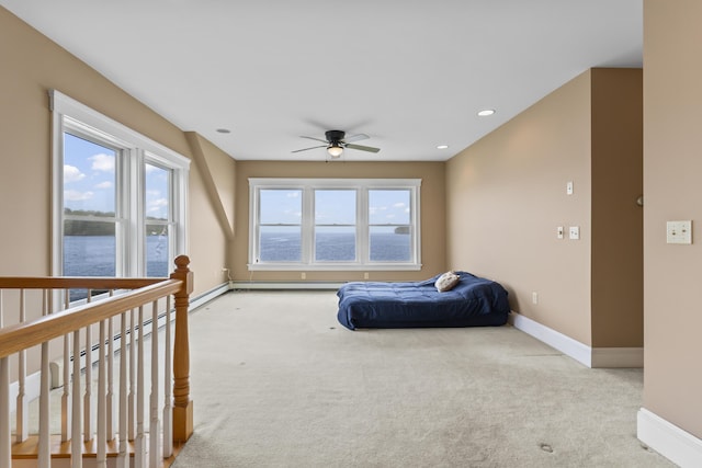 15 Church Ln, Phippsburg, ME 04562 - bedroom featuring carpet, baseboards, a water view, recessed lighting, and a ceiling fan