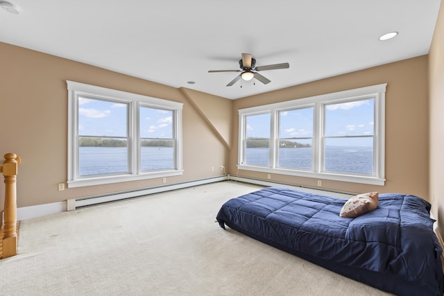 15 Church Ln, Phippsburg, ME 04562 - carpeted bedroom with a baseboard heating unit, a water view, recessed lighting, and a ceiling fan