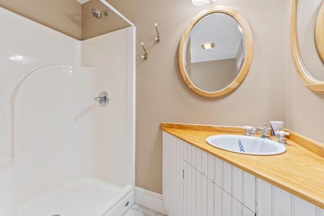 15 Church Ln, Phippsburg, ME 04562 - full bathroom featuring a stall shower, tile patterned flooring, and vanity