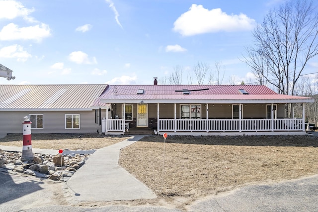 450 W Rd, Waterboro, ME 04087 - view of front of property featuring covered porch and metal roof
