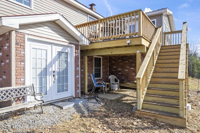 450 W Rd, Waterboro, ME 04087 - entrance to property featuring brick siding, a wooden deck, and french doors
