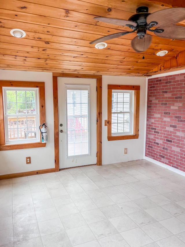 450 W Rd, Waterboro, ME 04087 - doorway to outside featuring wooden ceiling, a ceiling fan, and brick wall