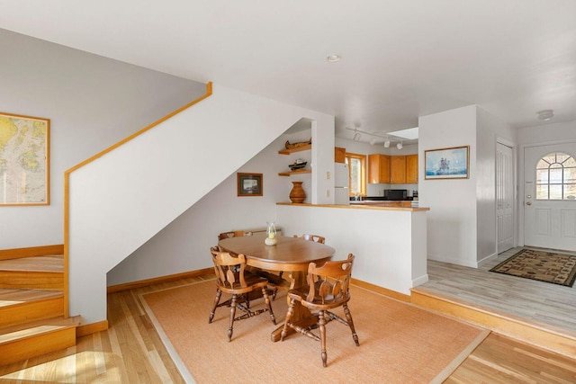 15 Eds Rd, Camden, ME 04843 - dining space featuring light wood-style floors and track lighting