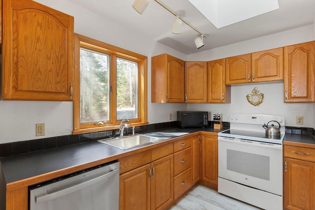 15 Eds Rd, Camden, ME 04843 - kitchen featuring electric range, stainless steel dishwasher, black microwave, and dark countertops