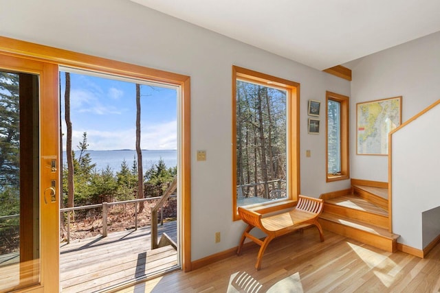 15 Eds Rd, Camden, ME 04843 - entryway with a water view, light wood-type flooring, and stairway