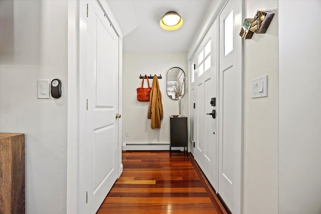 81 Forest Ave, Portland, ME 04101 - hall with dark wood finished floors and a baseboard heating unit