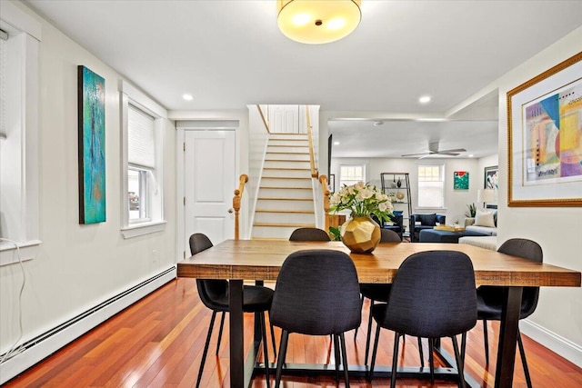 81 Forest Ave, Portland, ME 04101 - dining room featuring a baseboard radiator, wood finished floors, stairway, recessed lighting, and a ceiling fan