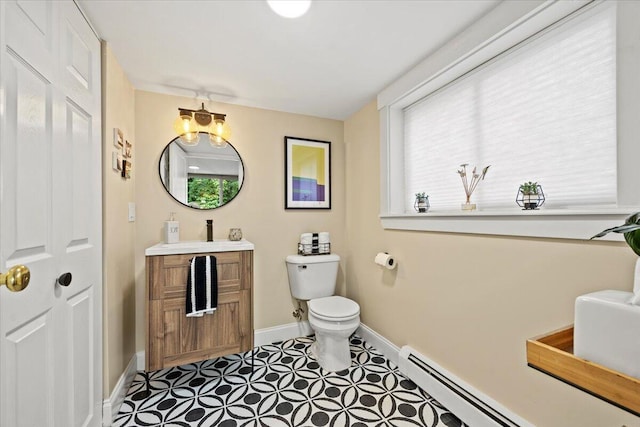 81 Forest Ave, Portland, ME 04101 - bathroom with vanity and a baseboard heating unit