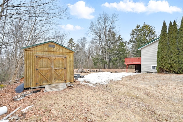 exterior space featuring an outdoor structure and a storage shed