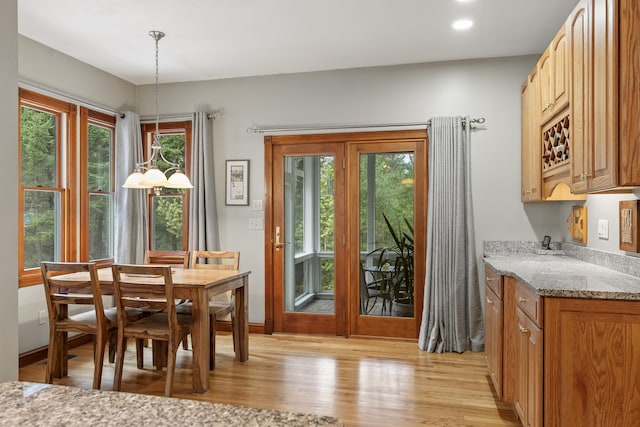 39 Catlin Shore Rd, Harpswell, ME 04079 - dining space with light wood-style flooring and recessed lighting