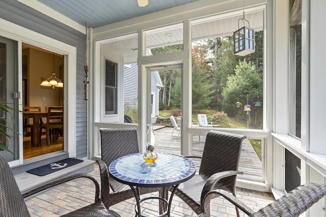 39 Catlin Shore Rd, Harpswell, ME 04079 - sunroom / solarium with a chandelier