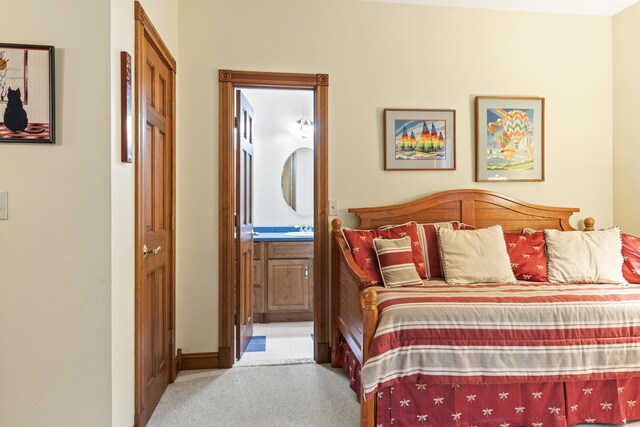 39 Catlin Shore Rd, Harpswell, ME 04079 - bedroom with connected bathroom, carpet, and a sink