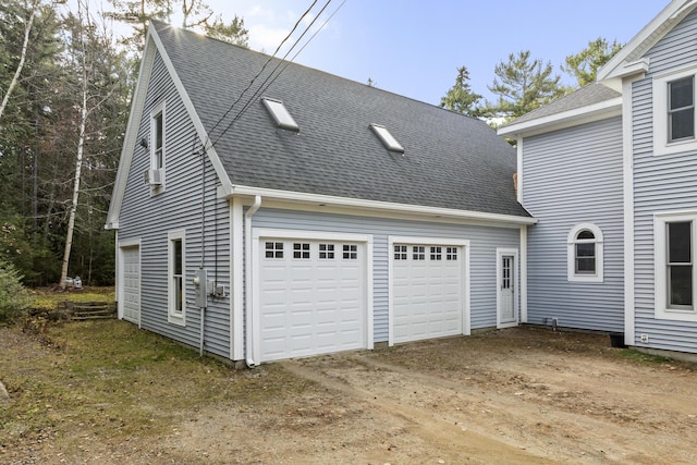 39 Catlin Shore Rd, Harpswell, ME 04079 - garage featuring dirt driveway and cooling unit