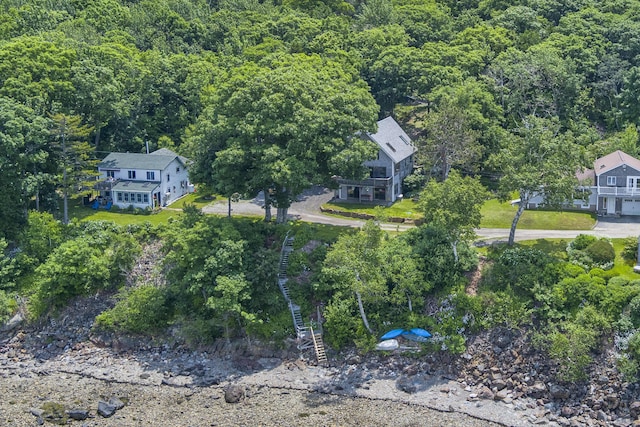 bird's eye view featuring a forest view