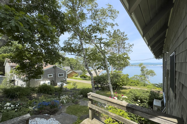view of yard with a water view