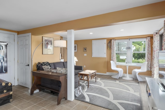living room featuring light tile patterned floors and recessed lighting