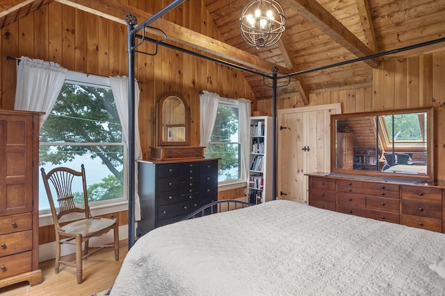 bedroom with light wood-style floors, wooden walls, wooden ceiling, lofted ceiling with beams, and a notable chandelier